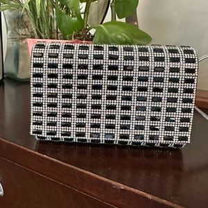 Black and Silver evening clutch. Excellent condition.